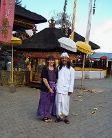 Nola with priest of Batur Temple, Bali