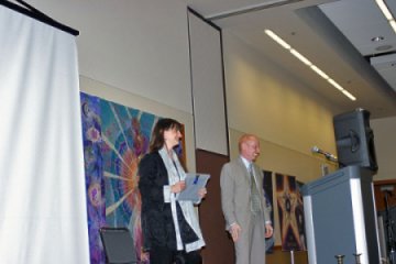 Nola receiving Ordinary People/Extraordinary Outcomes Award, click to see image full size